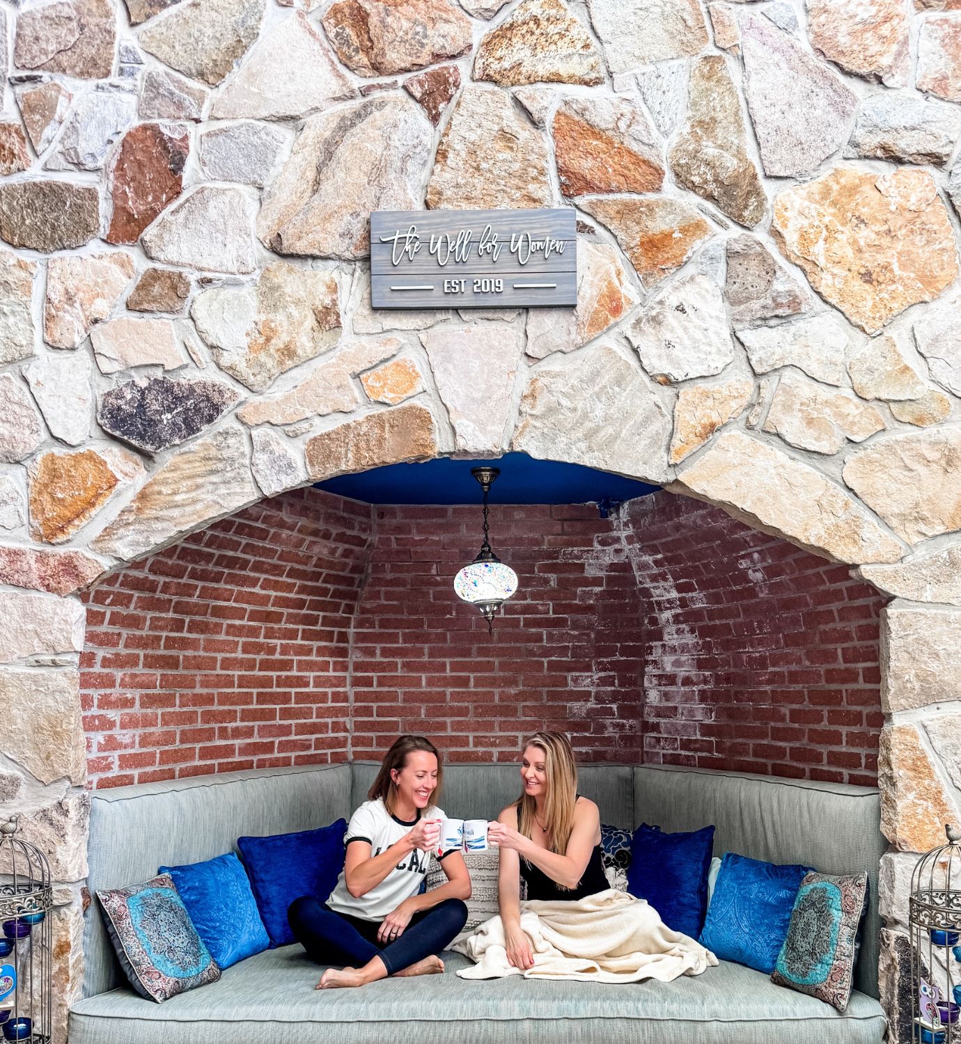 Women cozying up in Well for Women's New Haven massage spot